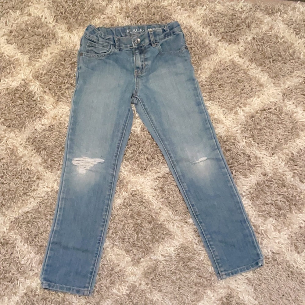 Girls ripped skinny jeans